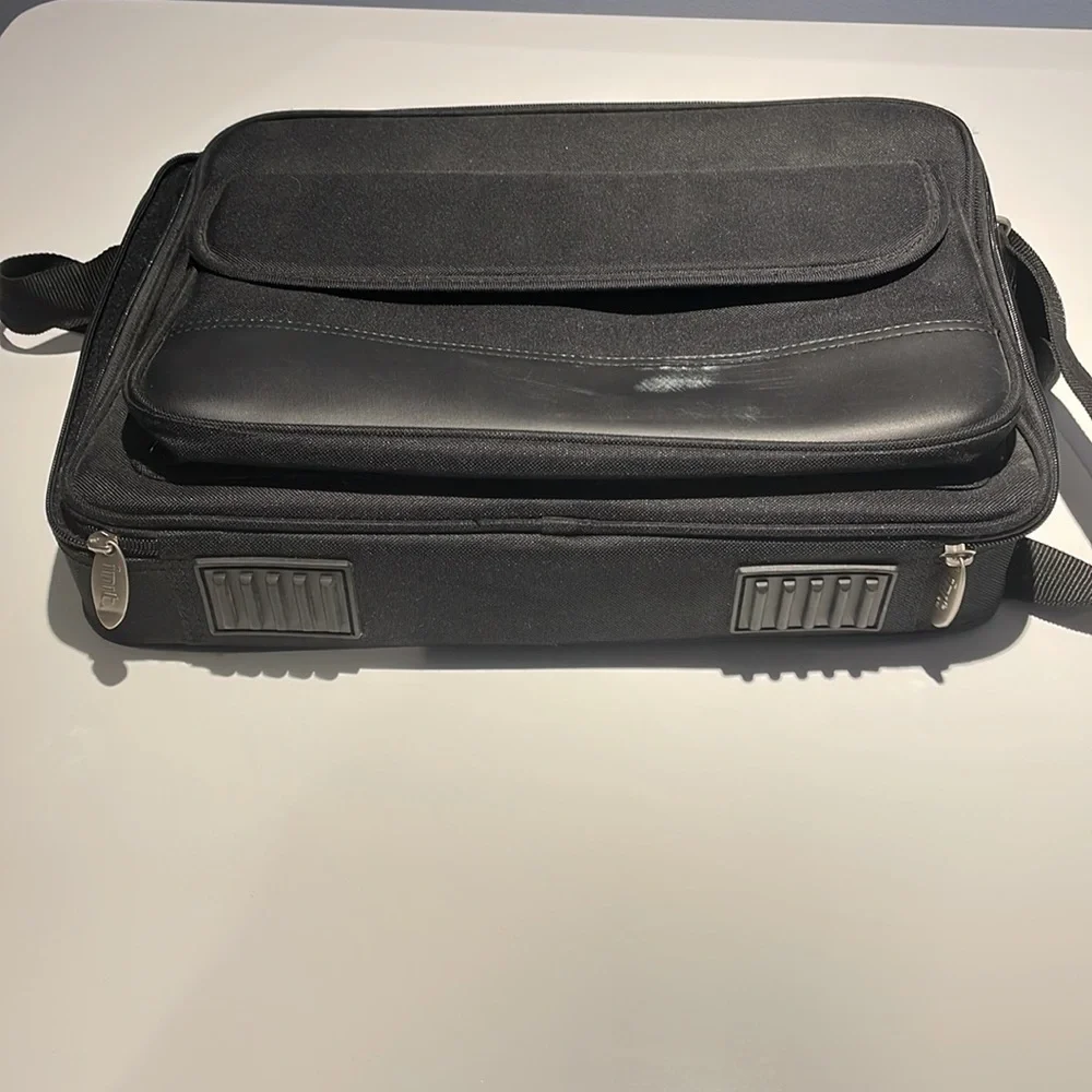 Black canvas init laptop bag. Black. Gently worn.